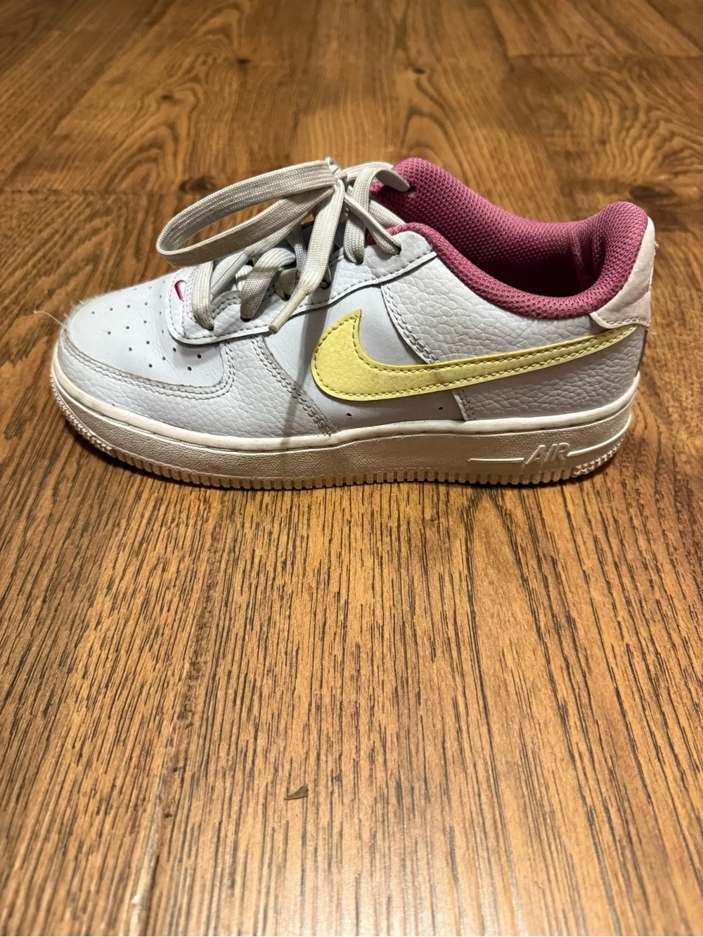 Nike Kids White Sneakers with Yellow Swoosh and Pink Lining